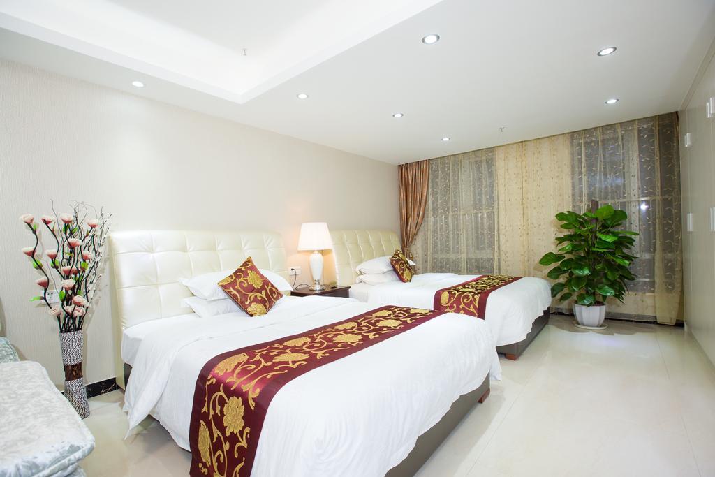 גואנגג'ואו Yo Yo Apartment Zheng Jia Dong Fang Branch חדר תמונה